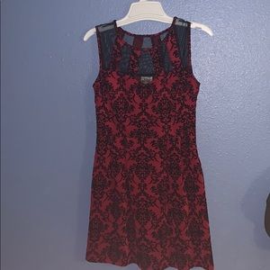 Velvet red dress with black elegant designs